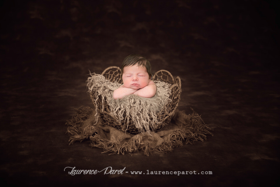 hoto bebe dans un panier studio essonne